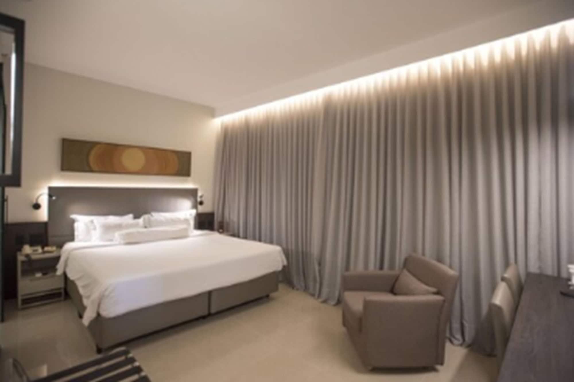 Royal Boutique Savassi Hotel Belo Horizonte Exterior photo A bedroom at the hotel