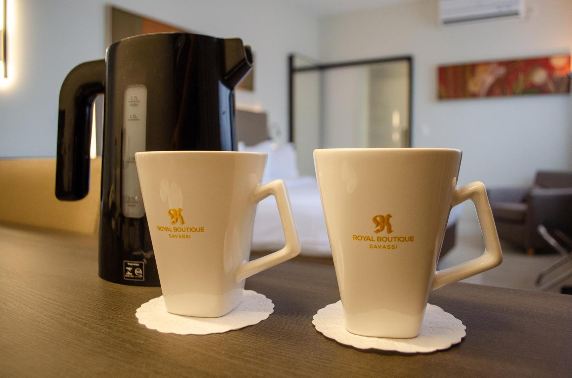 Royal Boutique Savassi Hotel Belo Horizonte Exterior photo A kettle and two cups