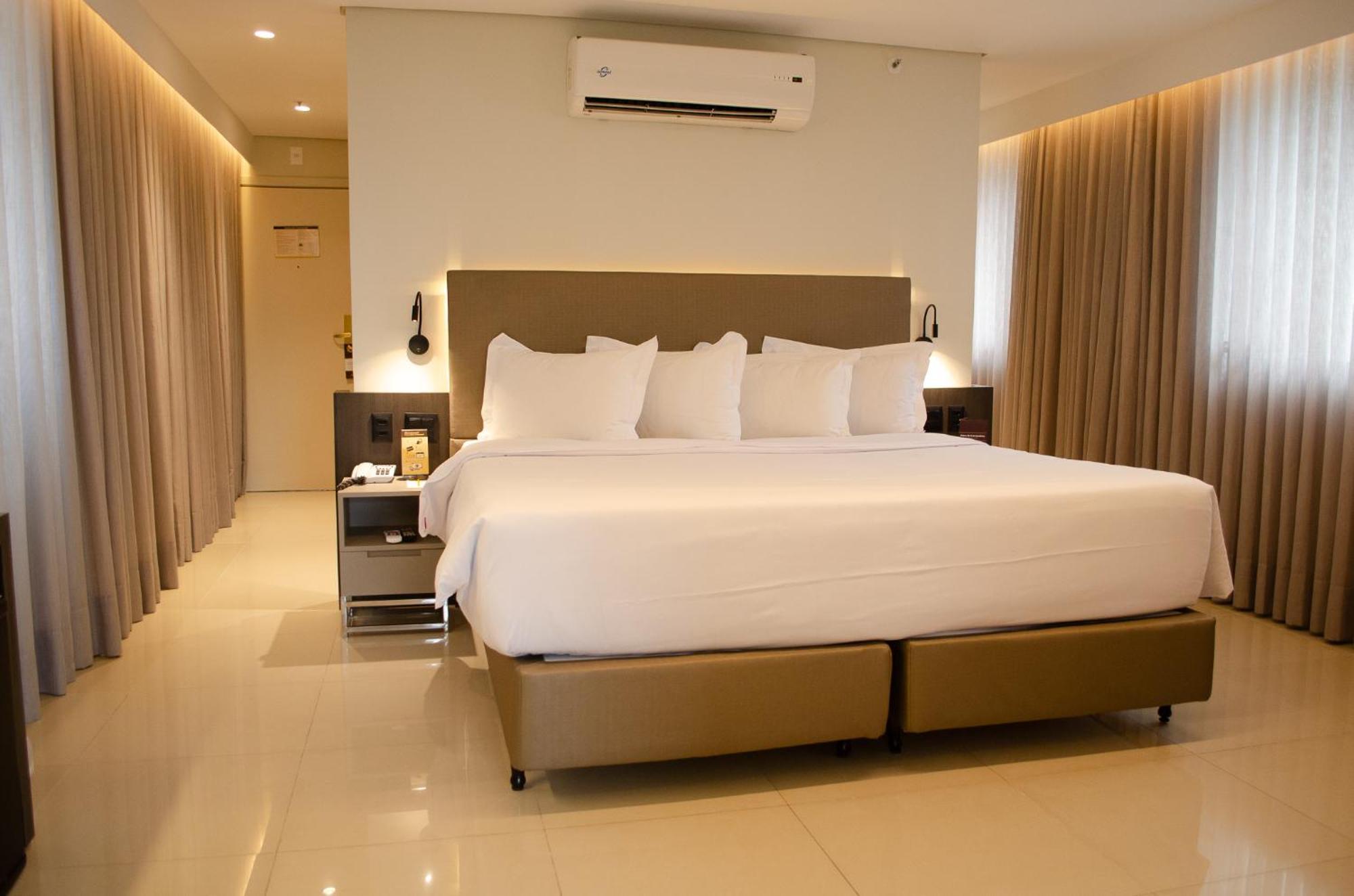 Royal Boutique Savassi Hotel Belo Horizonte Exterior photo A bedroom at the hotel